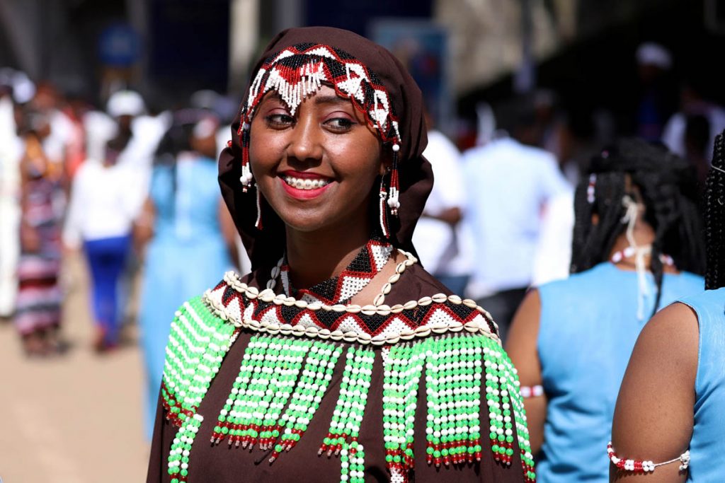 An Ethiopian Oromo woman dressed in a traditional costume takes part in the Irreecha celebration, the Oromo People thanksgiving ceremony in Addis Ababa, Ethiopia. October 5, 2019.REUTERS/Tiksa Negeri - RC18557AFA60